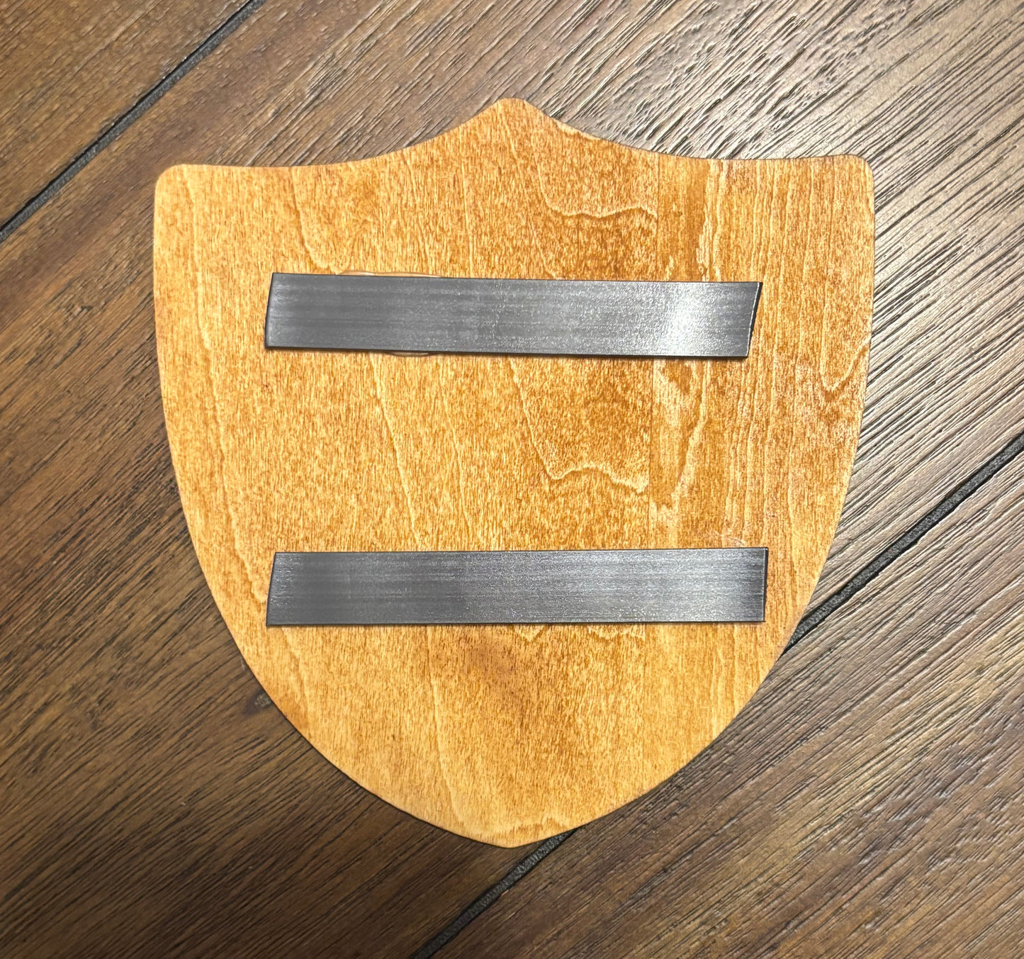 Stained basswood fridge magnet of the Las Vegas Raiders football team logo