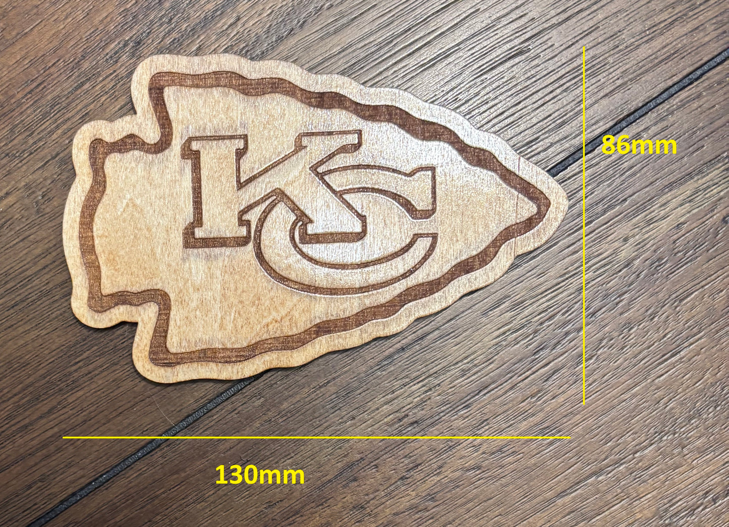 Stained basswood fridge magnet of the Kansas City Chiefs football team logo