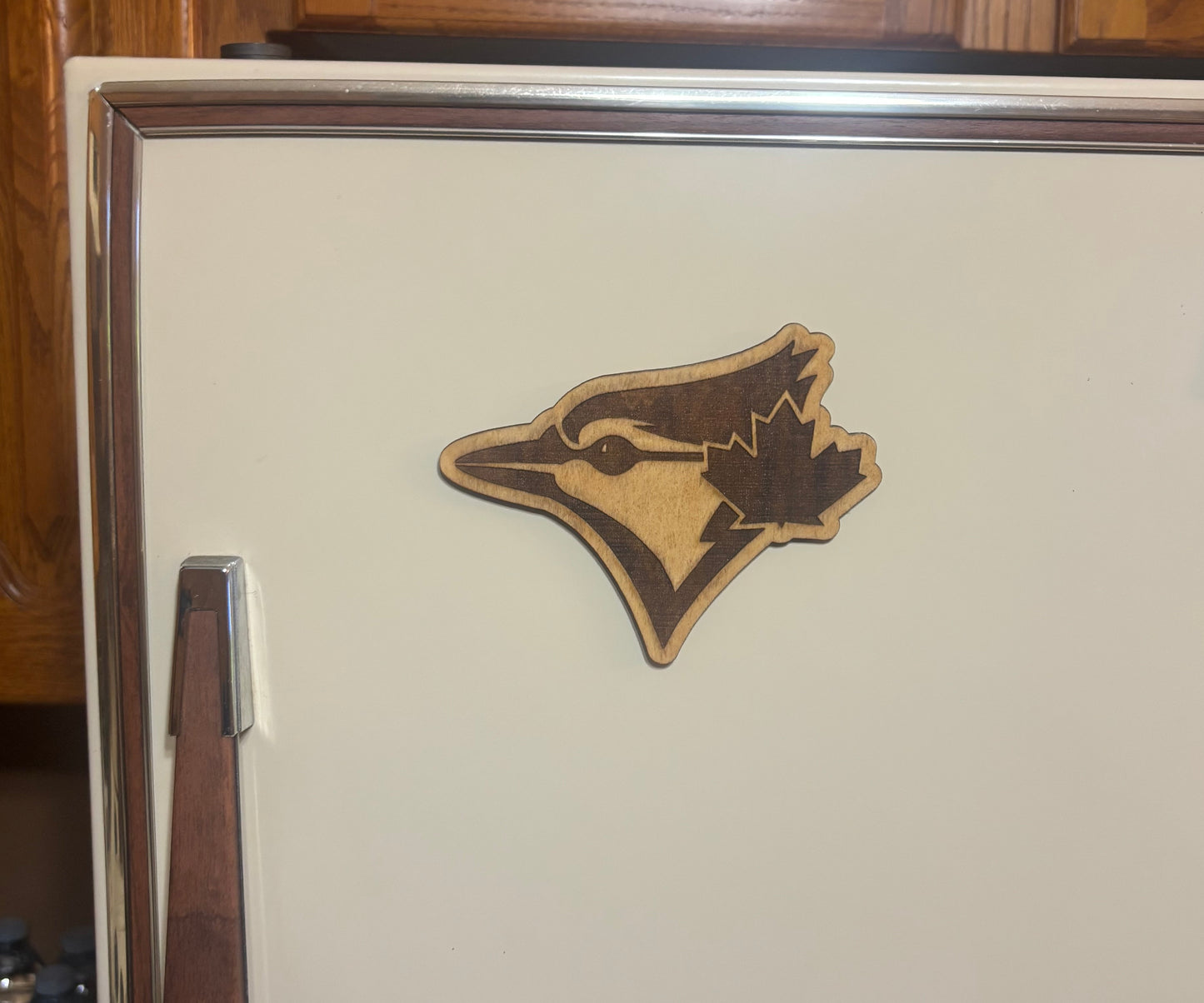Stained basswood fridge magnet of the Toronto Blue Jays baseball team logo