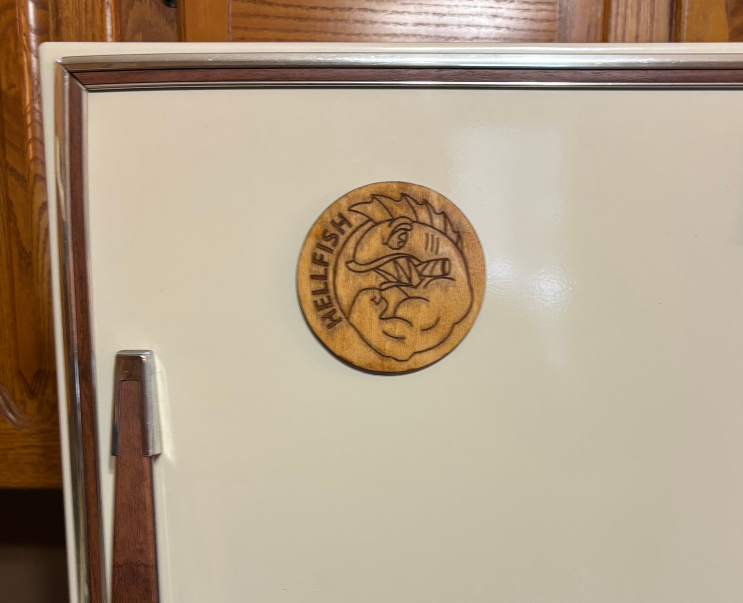 Stained basswood fridge magnet of the Flying Hellfish logo from the Simpsons