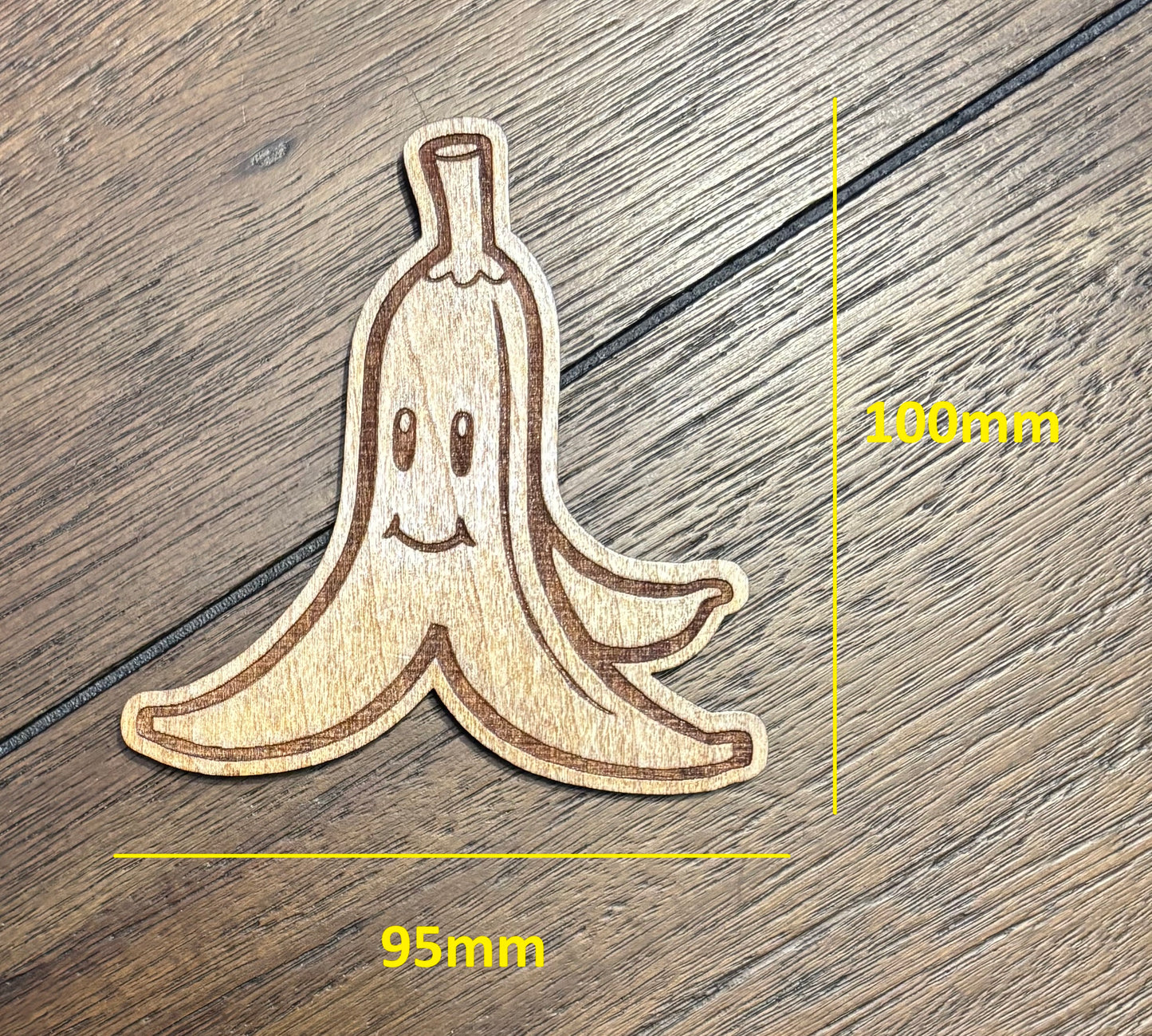 Stained basswood fridge magnet of a Banana peel the Mario video games