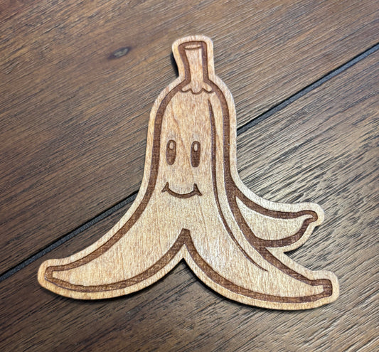 Stained basswood fridge magnet of a Banana peel the Mario video games