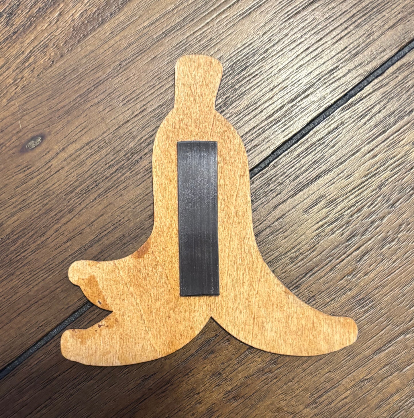 Stained basswood fridge magnet of a Banana peel the Mario video games