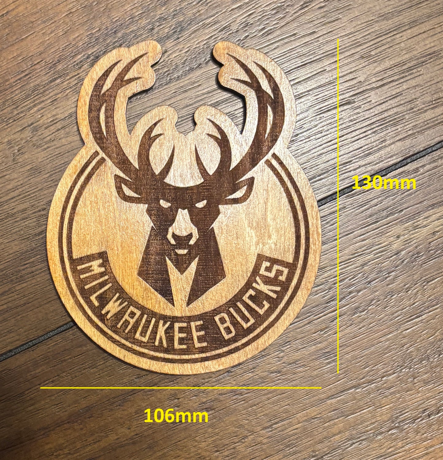 Stained basswood fridge magnet of the Milwaukee Bucks basketball team logo