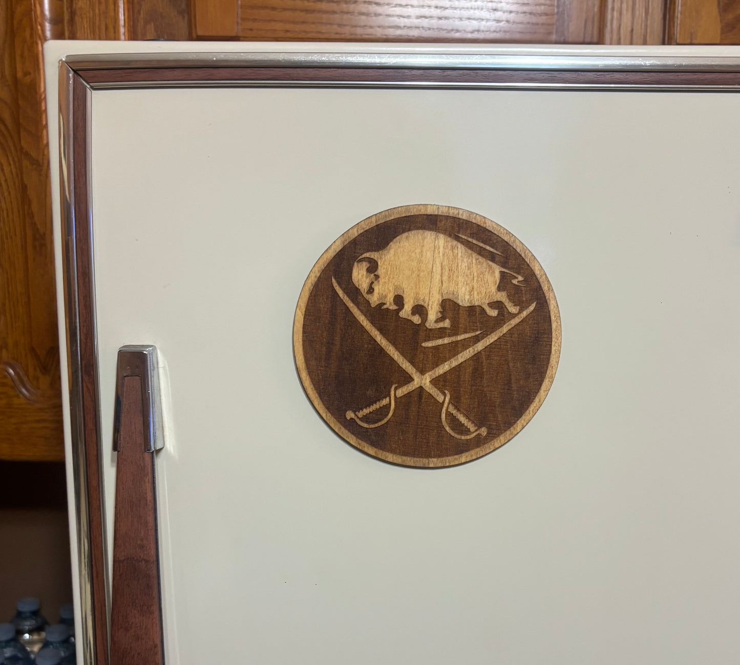 Stained basswood fridge magnet of the Buffalo Sabres hockey team logo