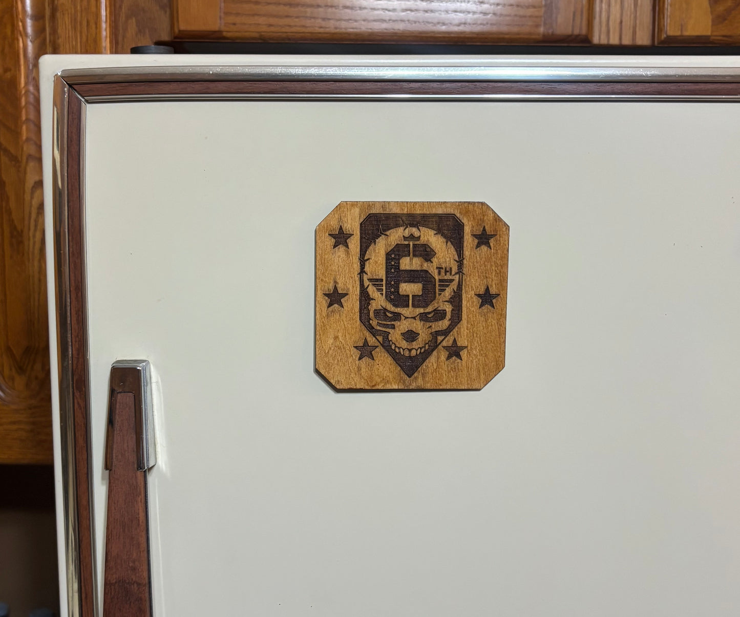 Stained basswood fridge magnet of the 6th Street gang logo from the Cyberpunk 2077 video game