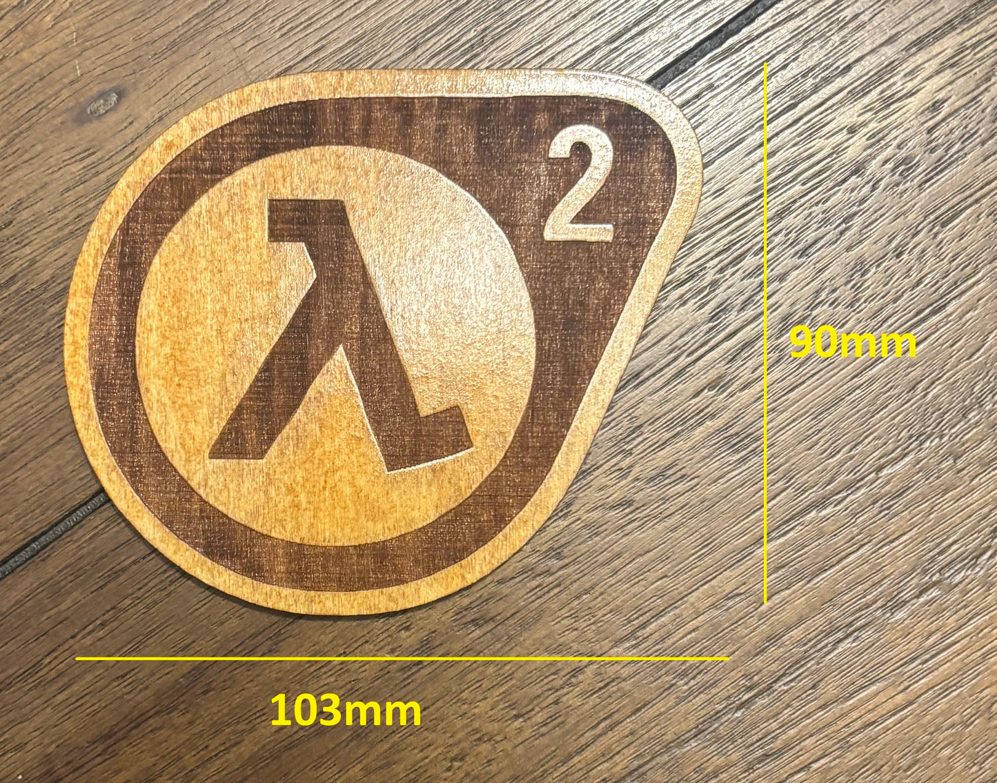 Stained basswood fridge magnet of the Half-Life 2 logo