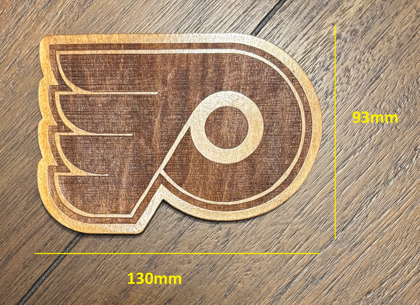 Stained basswood fridge magnet of the Philadelphia Flyers hockey team logo