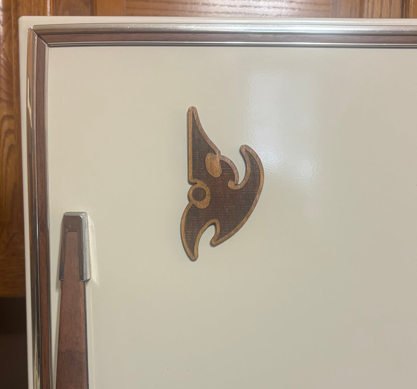 Stained basswood fridge magnet of the Protoss logo from the Starcraft video games