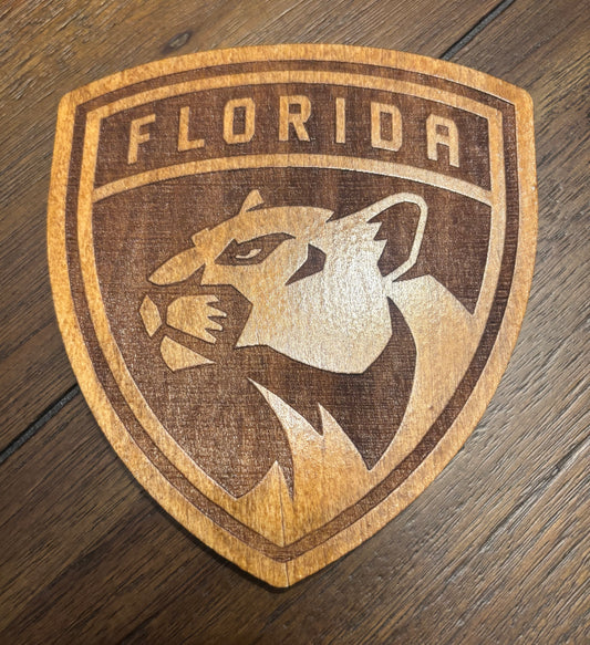 Stained basswood fridge magnet of the Florida Panthers hockey team logo