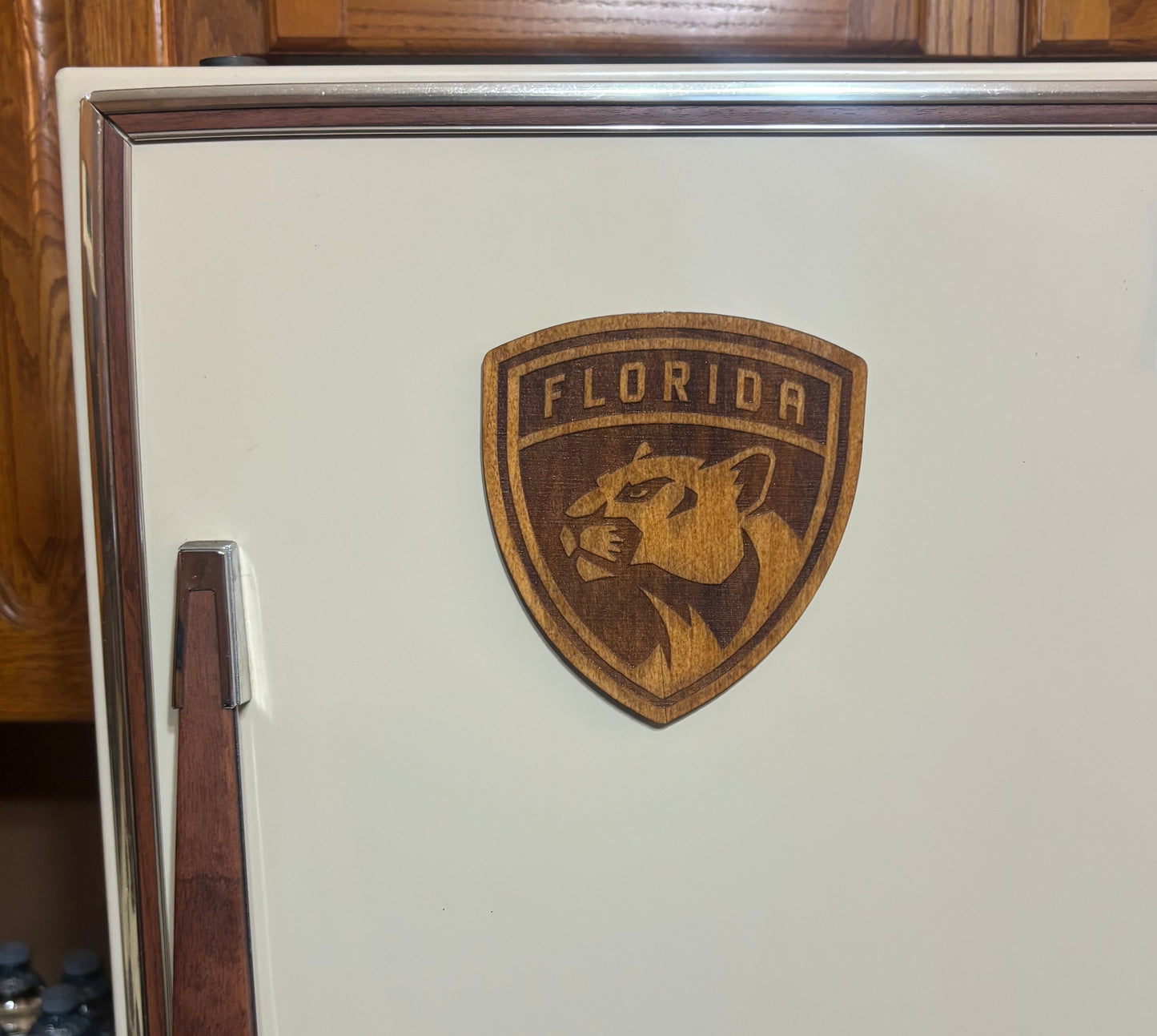 Stained basswood fridge magnet of the Florida Panthers hockey team logo