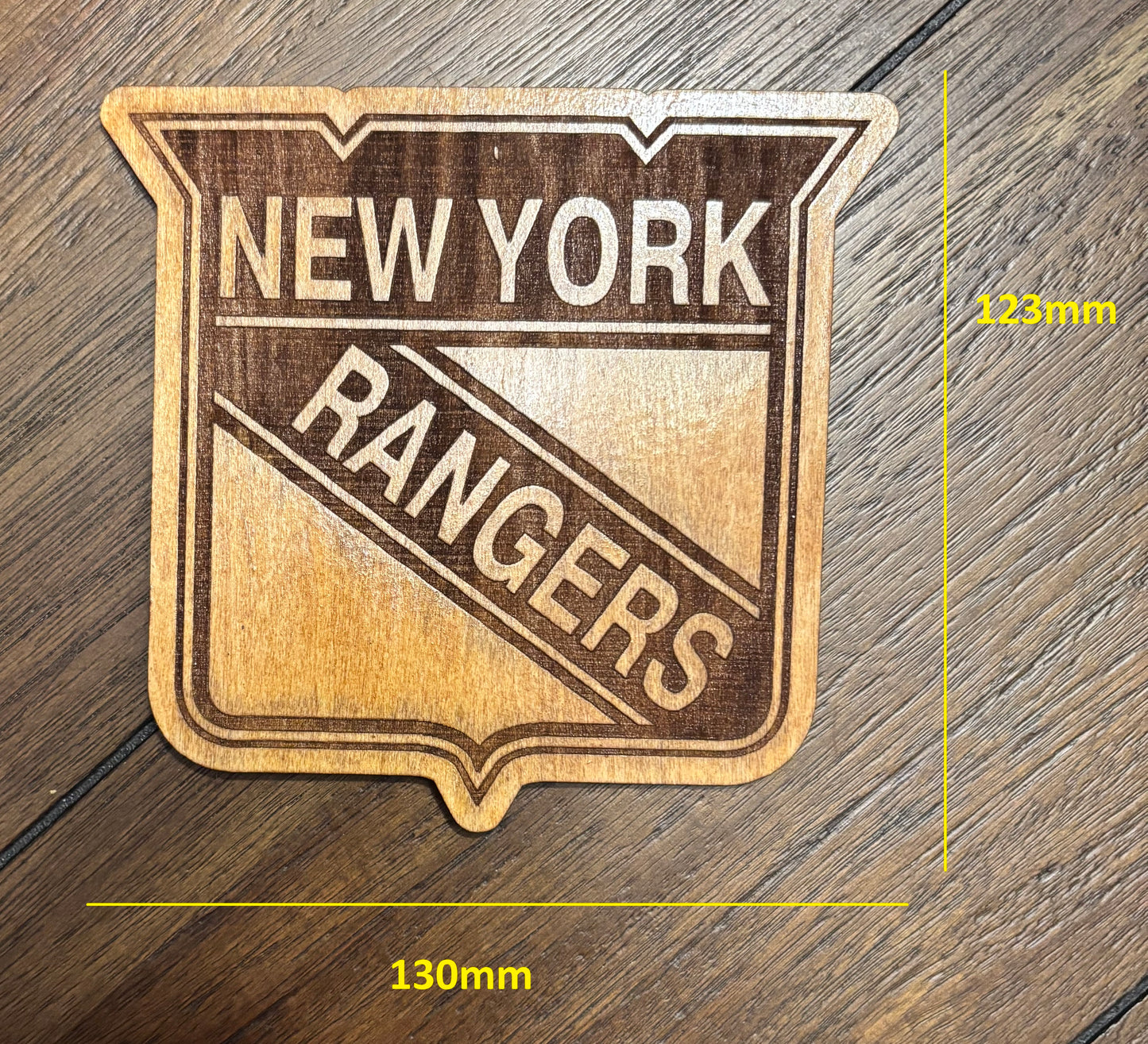 Stained basswood fridge magnet of the New York Rangers hockey team logo