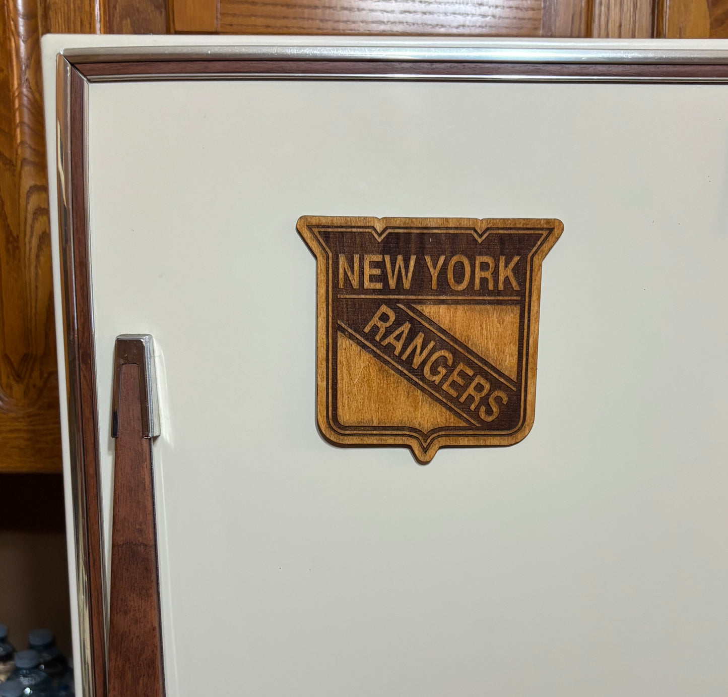 Stained basswood fridge magnet of the New York Rangers hockey team logo