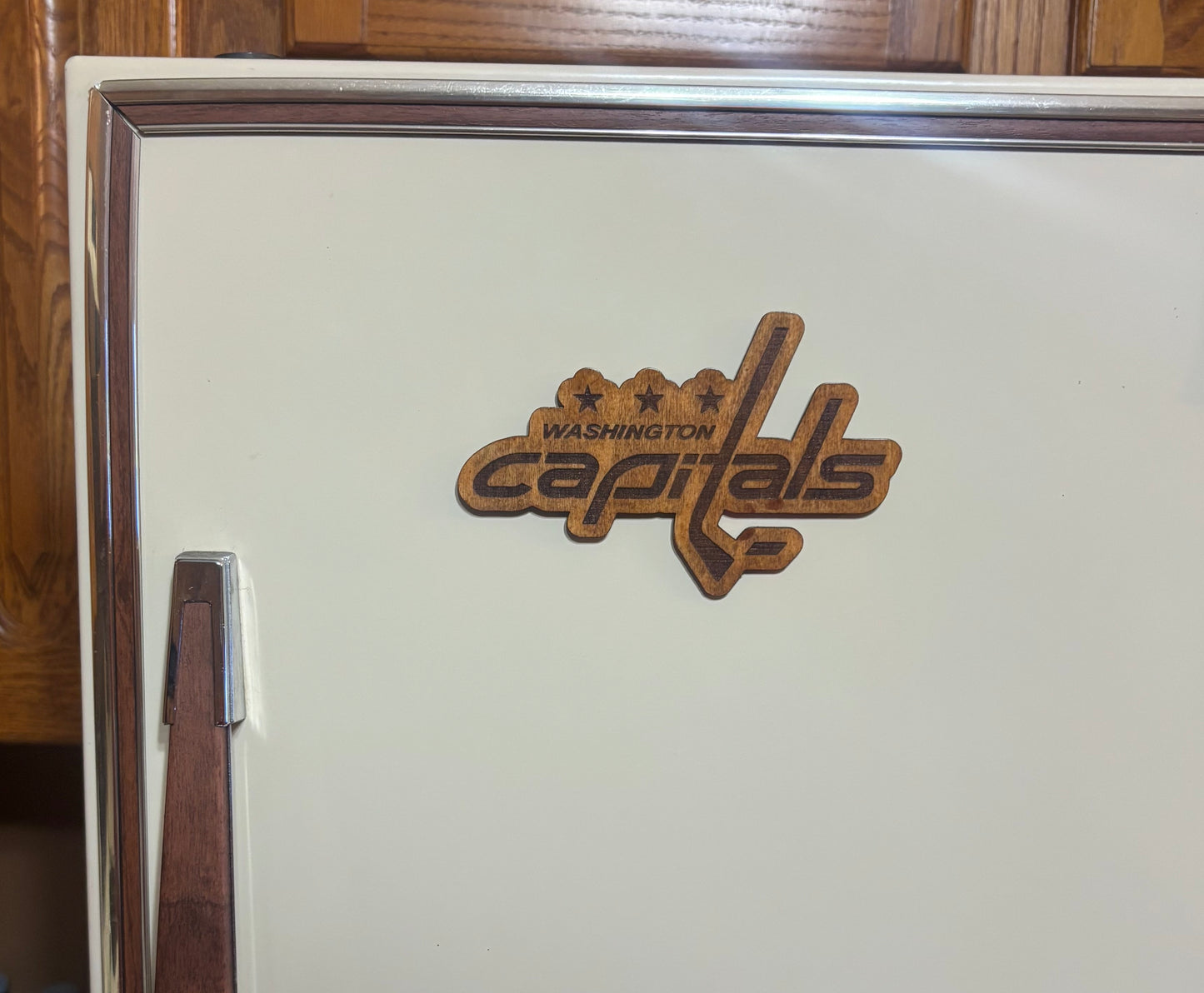 Stained basswood fridge magnet of the  Washington Capitals hockey team logo