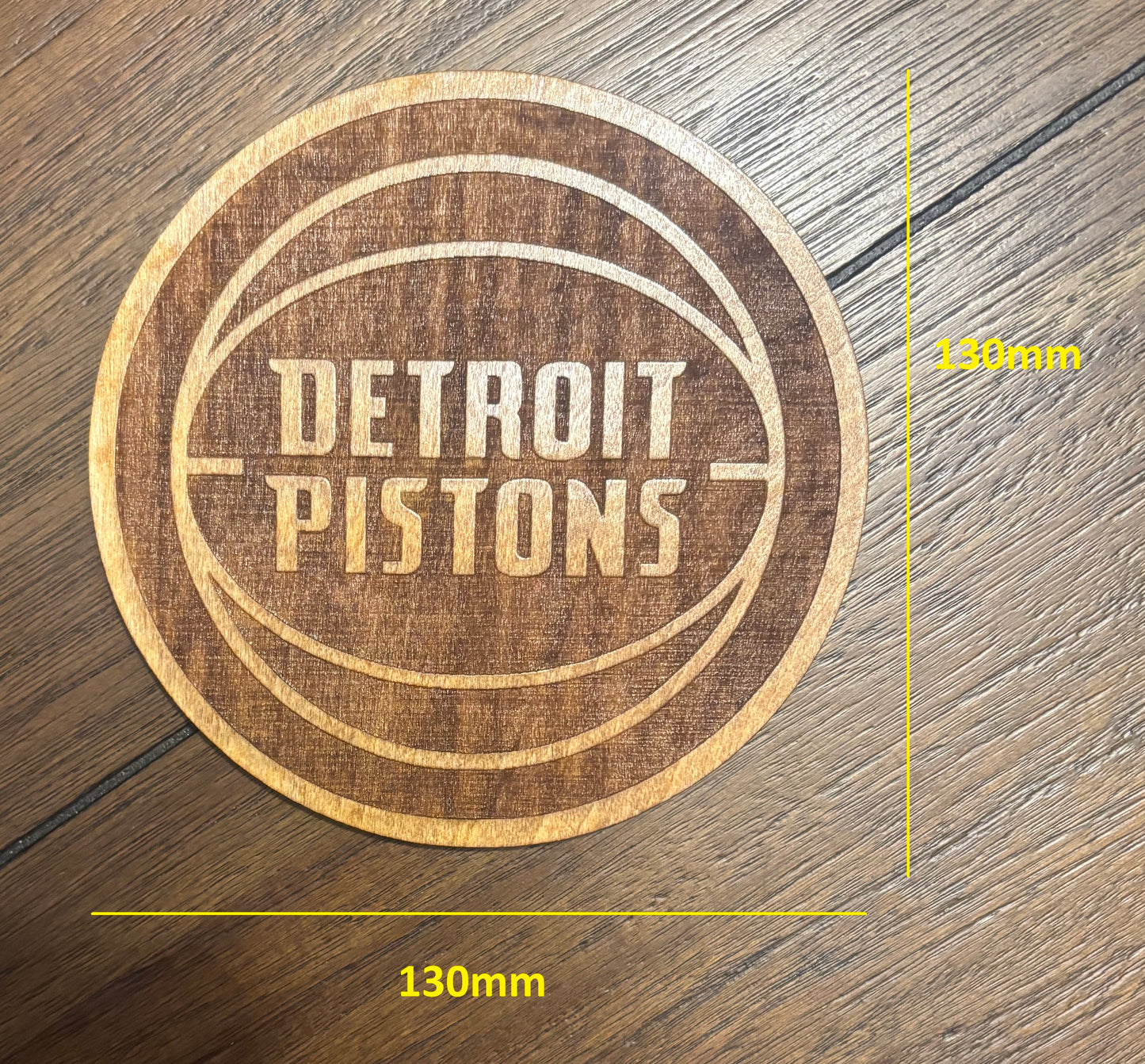 Stained basswood fridge magnet of the Detroit Pistons basketball team logo
