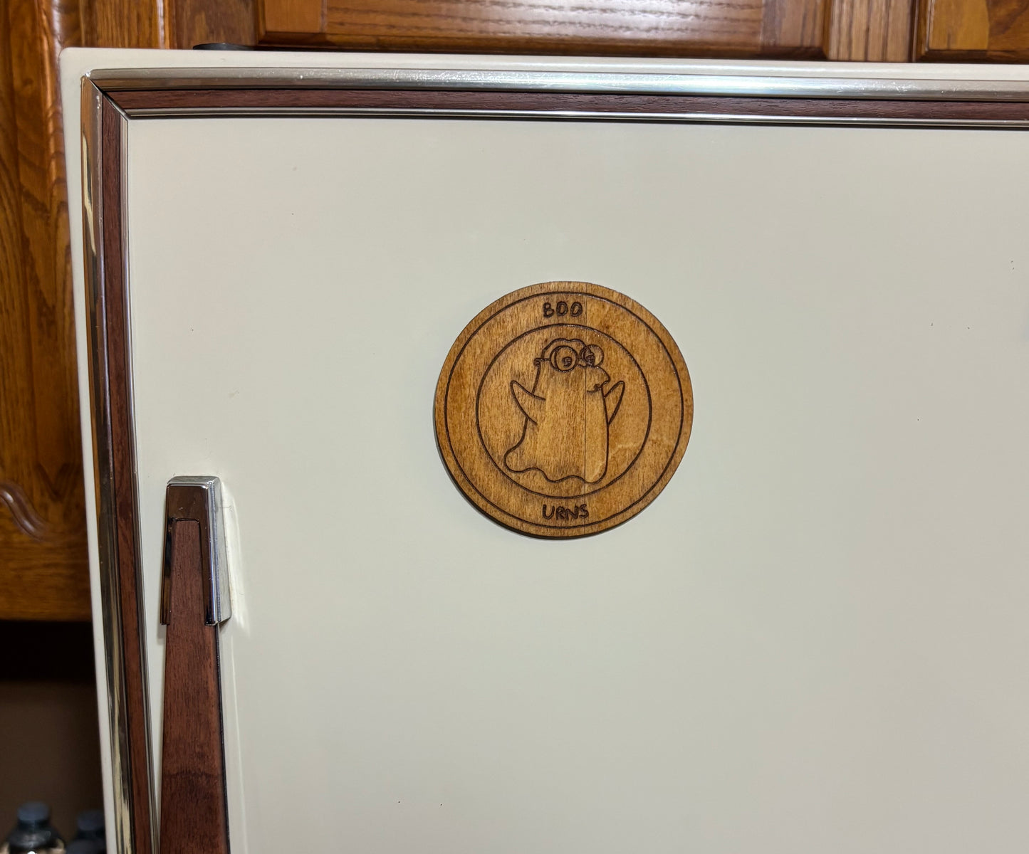 Stained basswood fridge magnet of Hans Moelman as a ghost saying boo-urns from the Simpsons