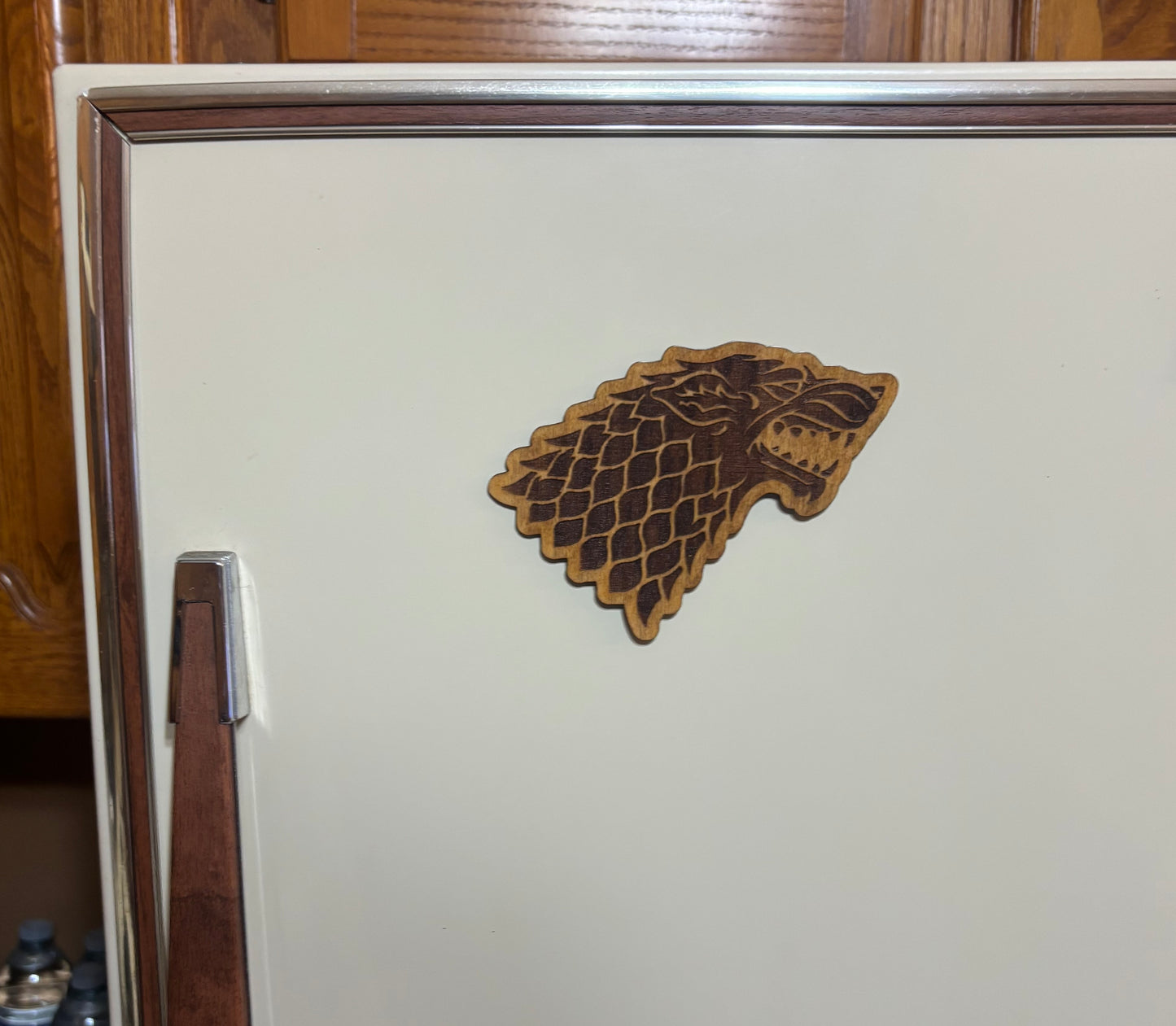 Stained basswood fridge magnet of the House Stark sigil from Game of Thrones
