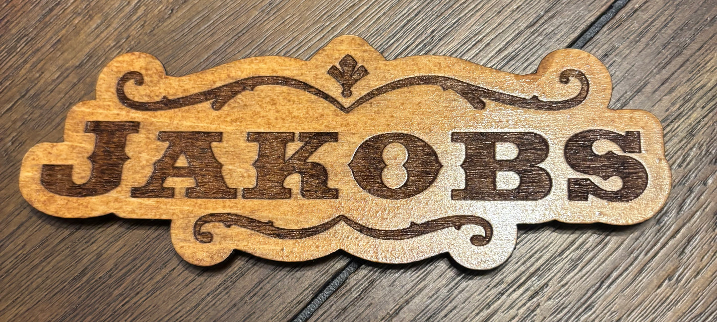 Stained basswood fridge magnet of the Jakobs logo from the Borderlands video games