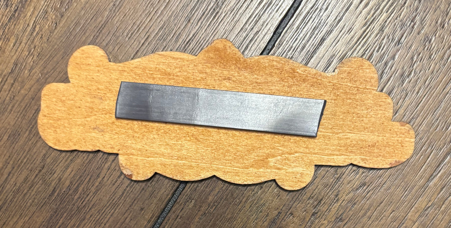 Stained basswood fridge magnet of the Jakobs logo from the Borderlands video games