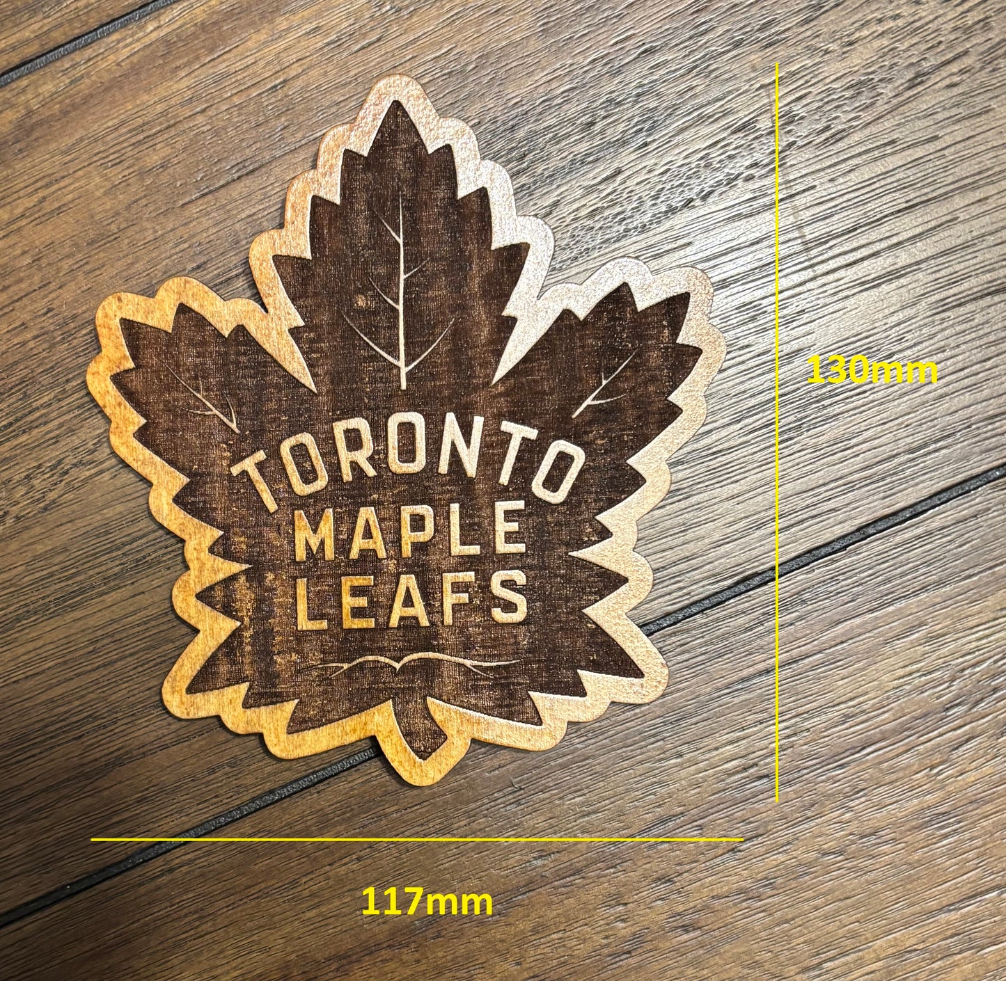 Stained basswood fridge magnet of the Toronto Maple Leafs hockey team logo