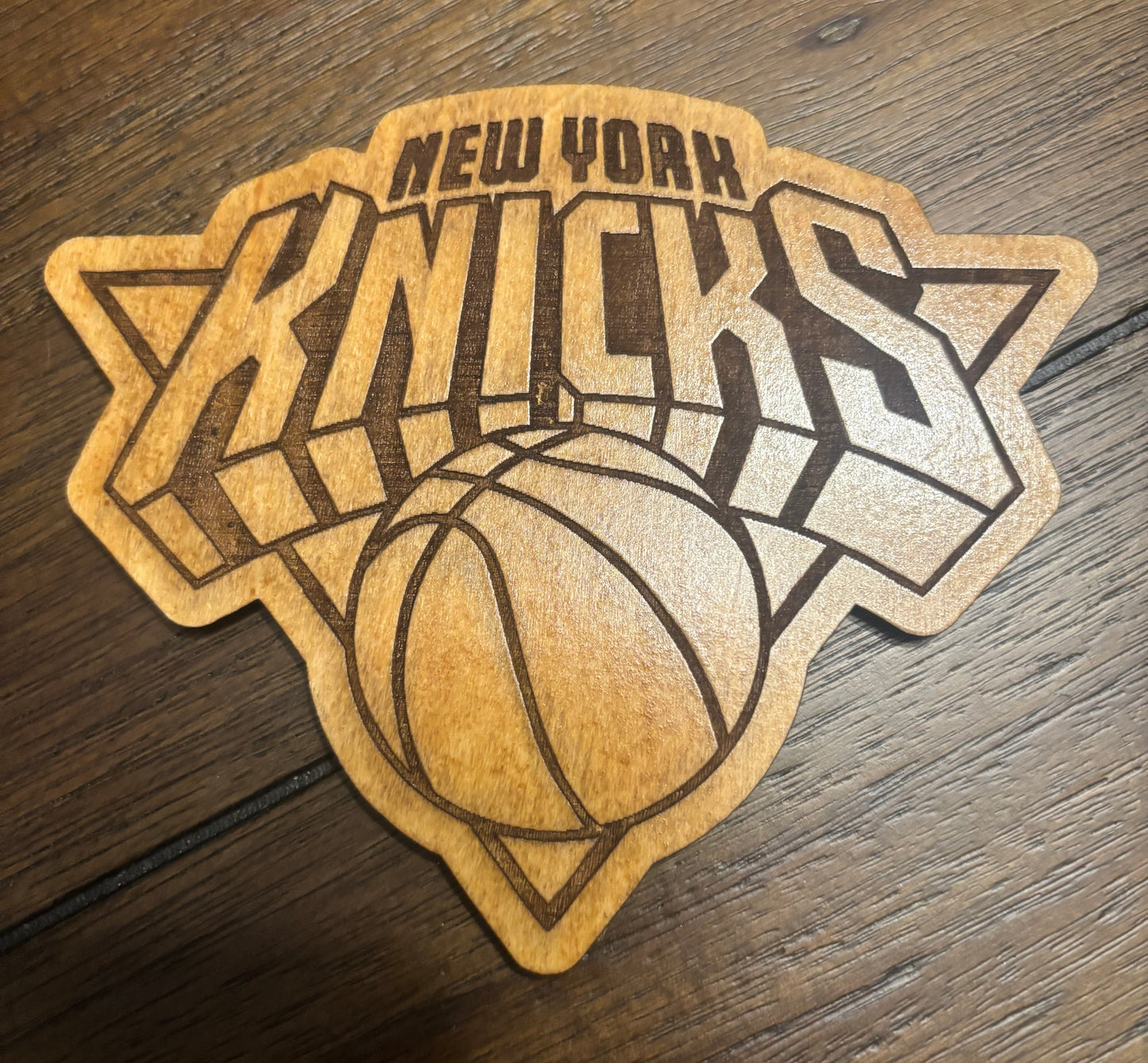 Stained basswood fridge magnet of the New York Knicks basketball team logo