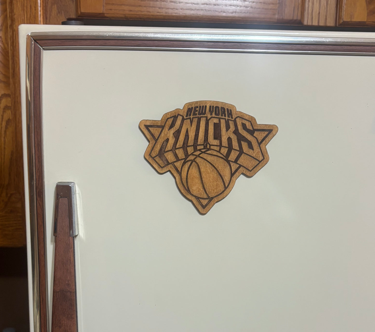 Stained basswood fridge magnet of the New York Knicks basketball team logo