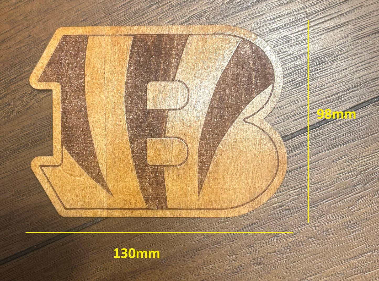 Stained basswood fridge magnet of the Cincinnati Bengals football team logo