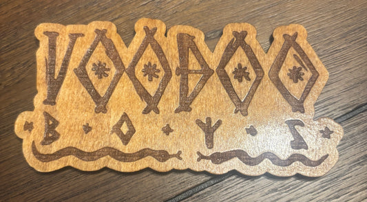 Stained basswood fridge magnet of the Voodoo Boys logo from the Cyberpunk 2077 video game