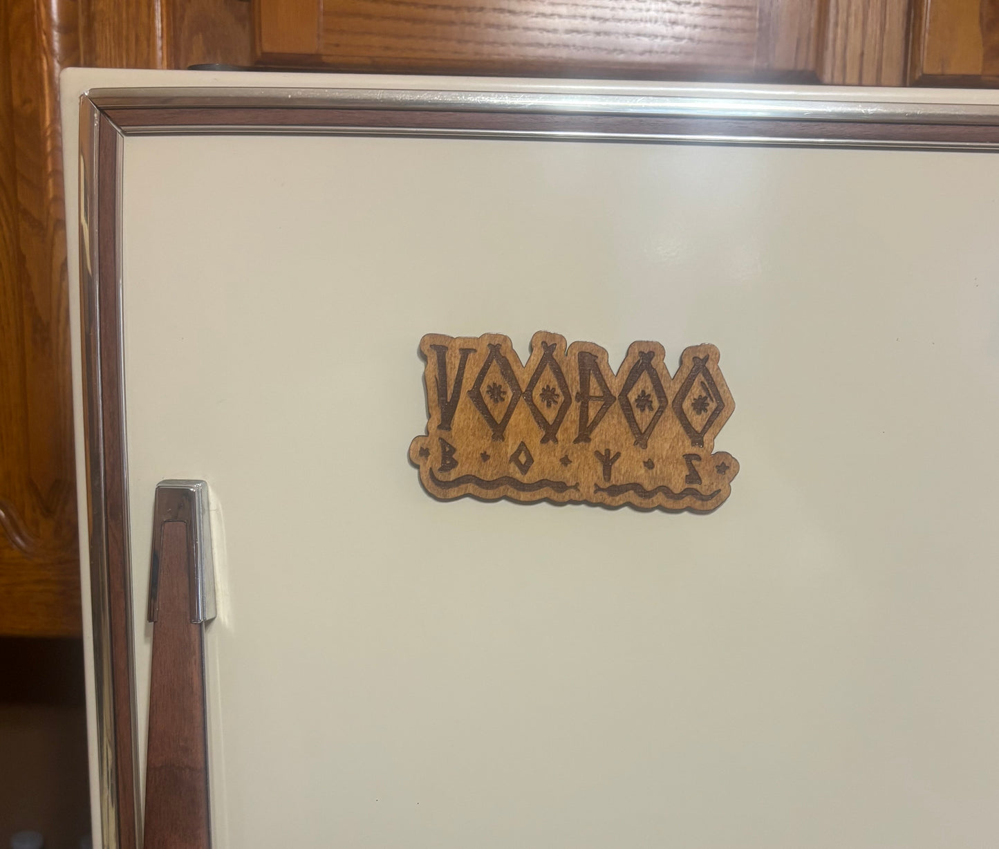 Stained basswood fridge magnet of the Voodoo Boys logo from the Cyberpunk 2077 video game
