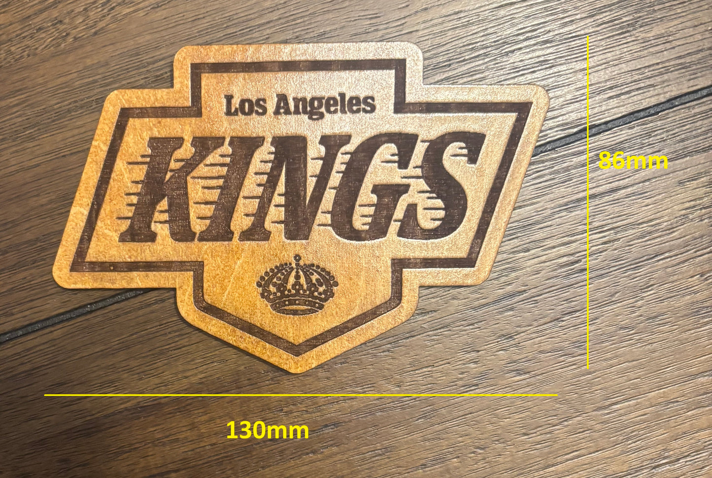 Stained basswood fridge magnet of the Los Angeles Kings hockey team logo