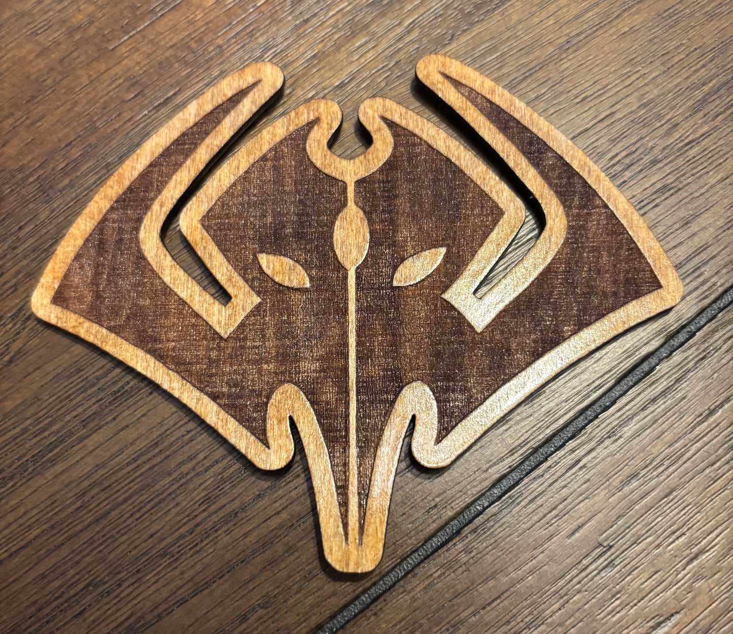 Stained basswood fridge magnet of the Mental logo from the video game Series Sam