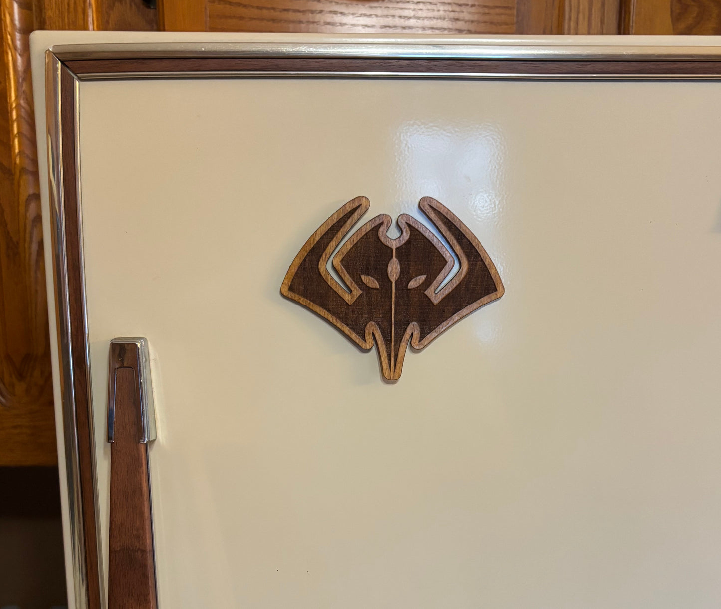 Stained basswood fridge magnet of the Mental logo from the video game Series Sam