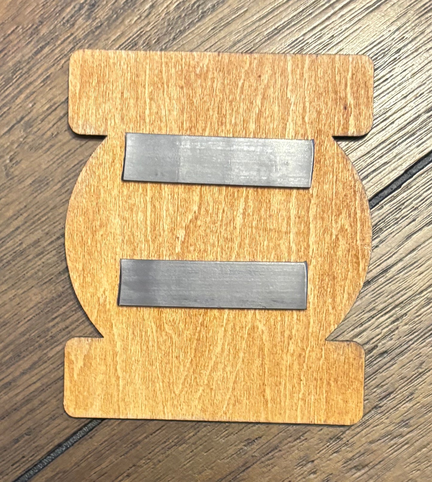 Stained basswood fridge magnet of the Green Lantern logo