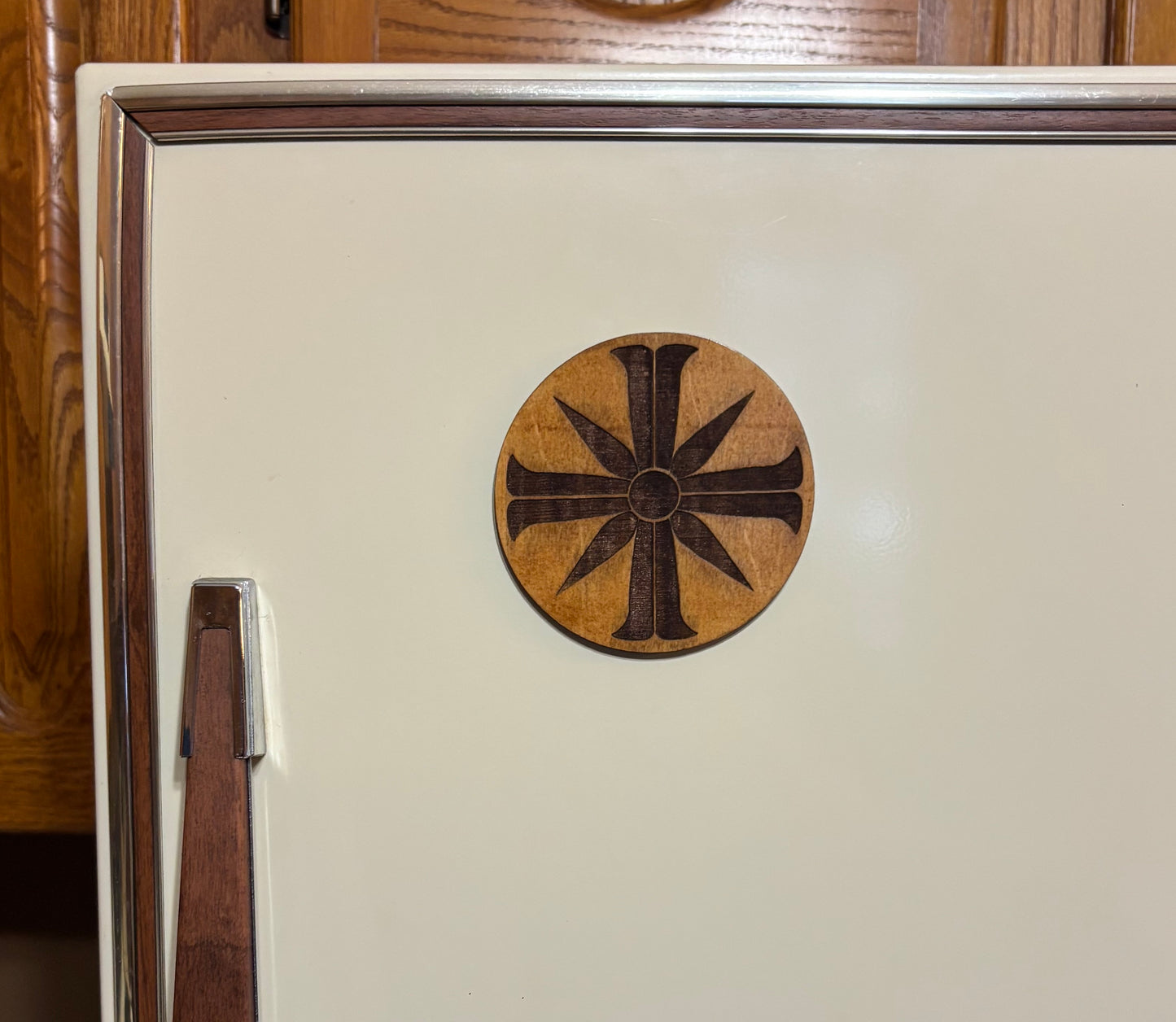 Stained basswood fridge magnet of the Project at Eden's Gate emblem from the video game Far Cry 5