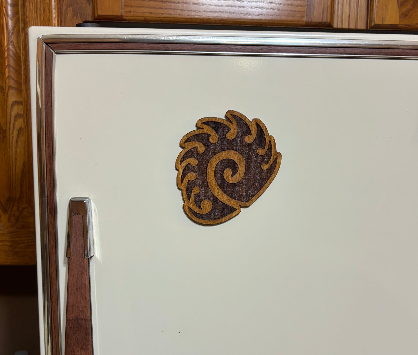 Stained basswood fridge magnet of the Zerg logo from the Starcraft video games