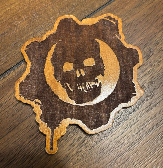 Stained basswood fridge magnet of the Gears of War logo