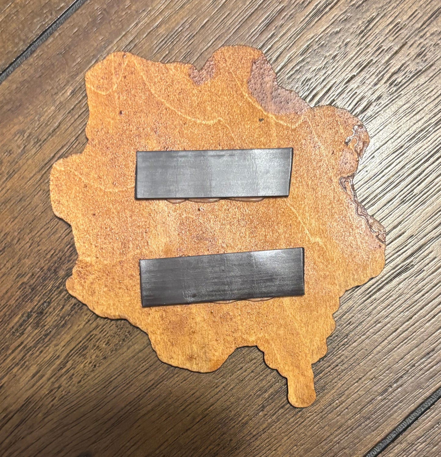 Stained basswood fridge magnet of the Gears of War logo