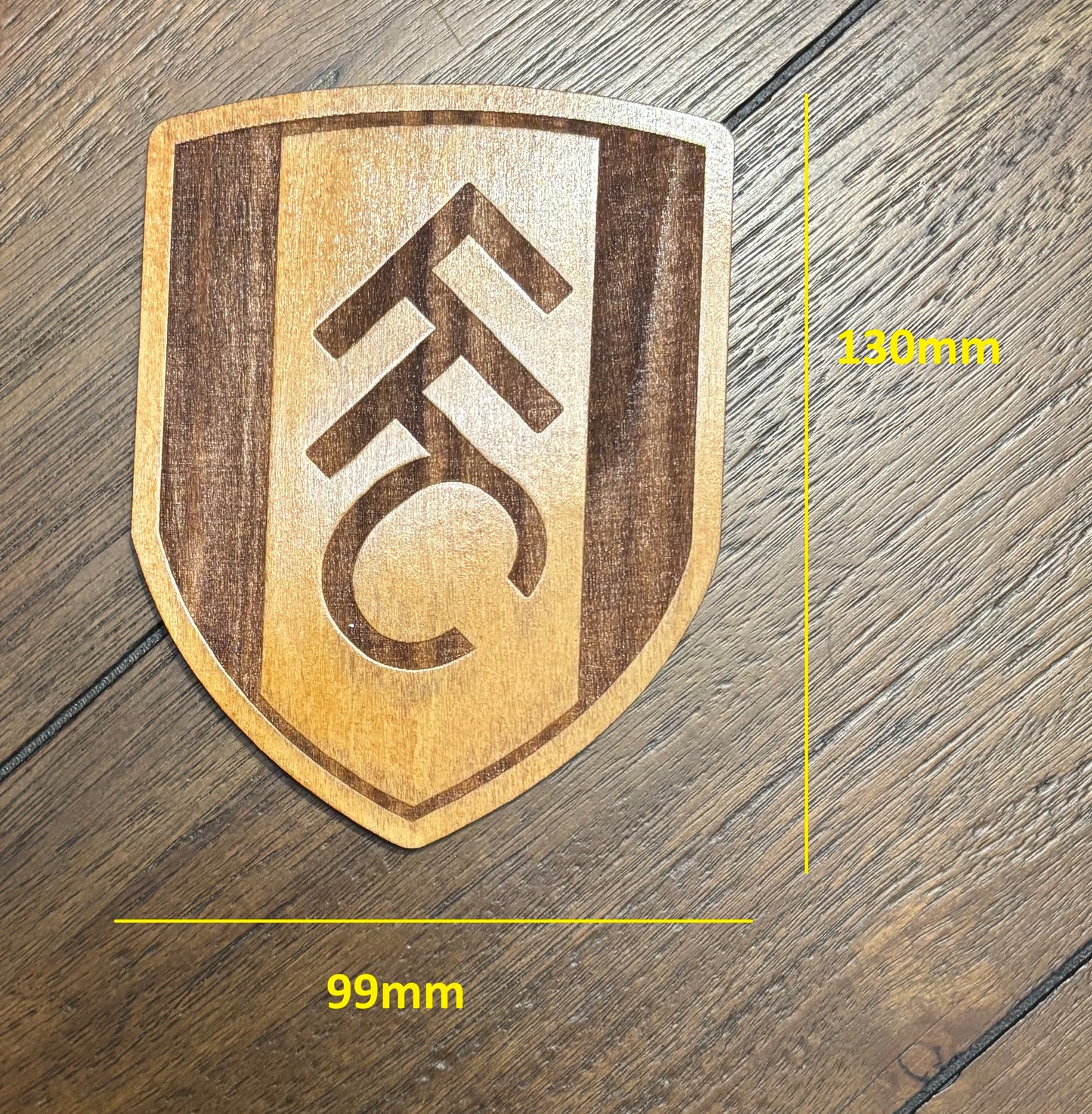 Stained basswood fridge magnet of the Fullham FC soccer team logo