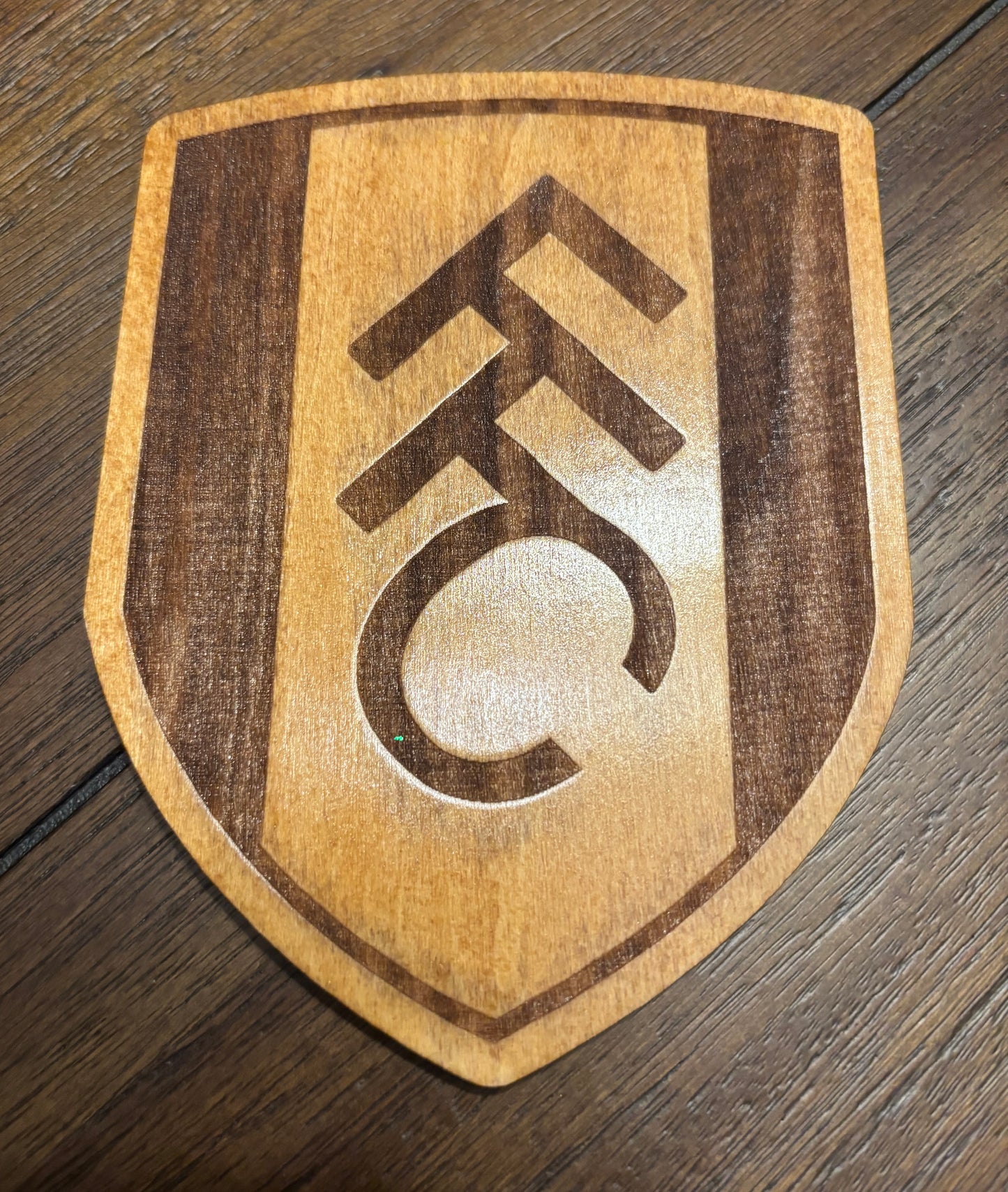 Stained basswood fridge magnet of the Fullham FC soccer team logo