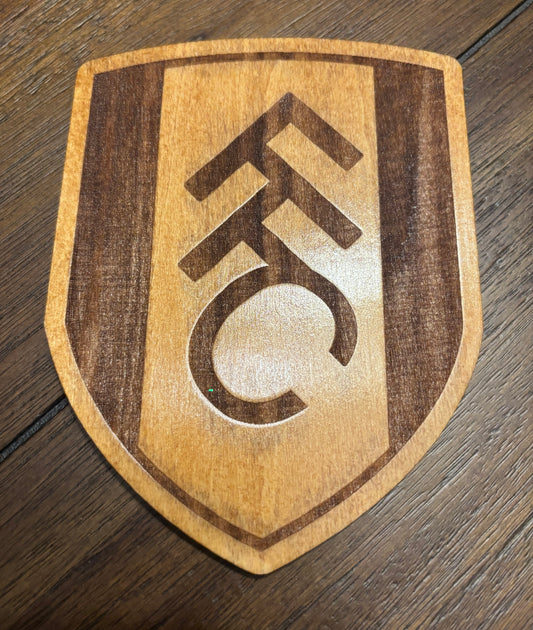Stained basswood fridge magnet of the Fullham FC soccer team logo