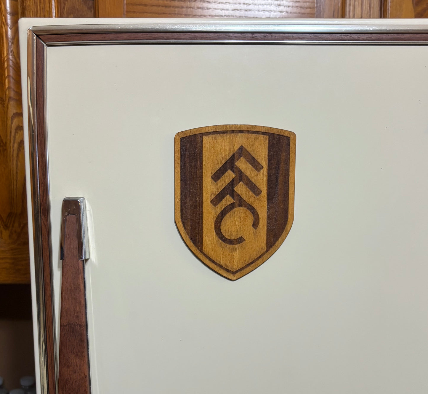 Stained basswood fridge magnet of the Fullham FC soccer team logo