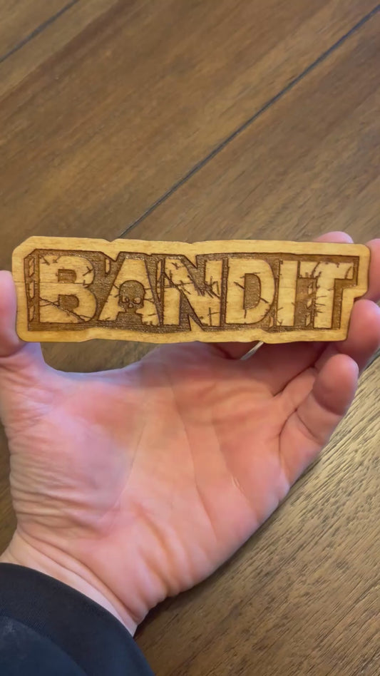 Stained basswood fridge magnet of the Bandit logo from the Borderlands video games