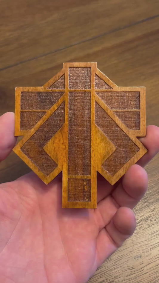 Stained basswood fridge magnet of the Advent logo from the X-COM video games
